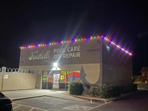 A beautiful multi coloured Christmas light install on a business