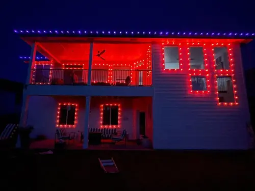 ORange LIghts around window and purple lights on roof